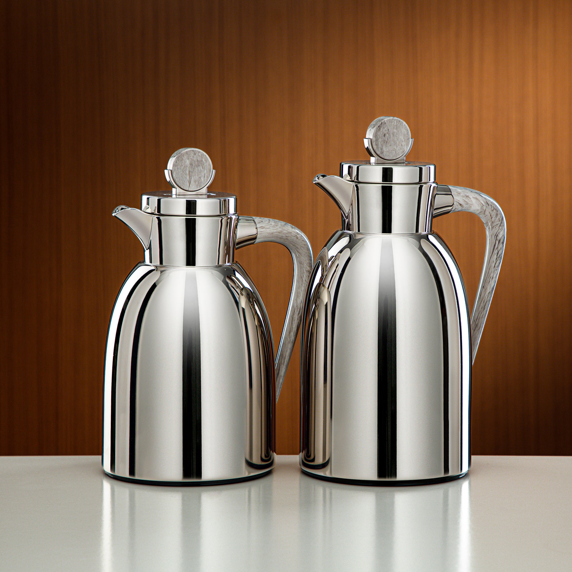 طقم ترامس المرجان قطعتان بلون النيكل والرخام